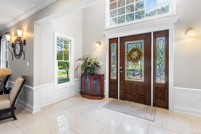 a kitchen with stainless steel appliances granite countertop a stove and a sink