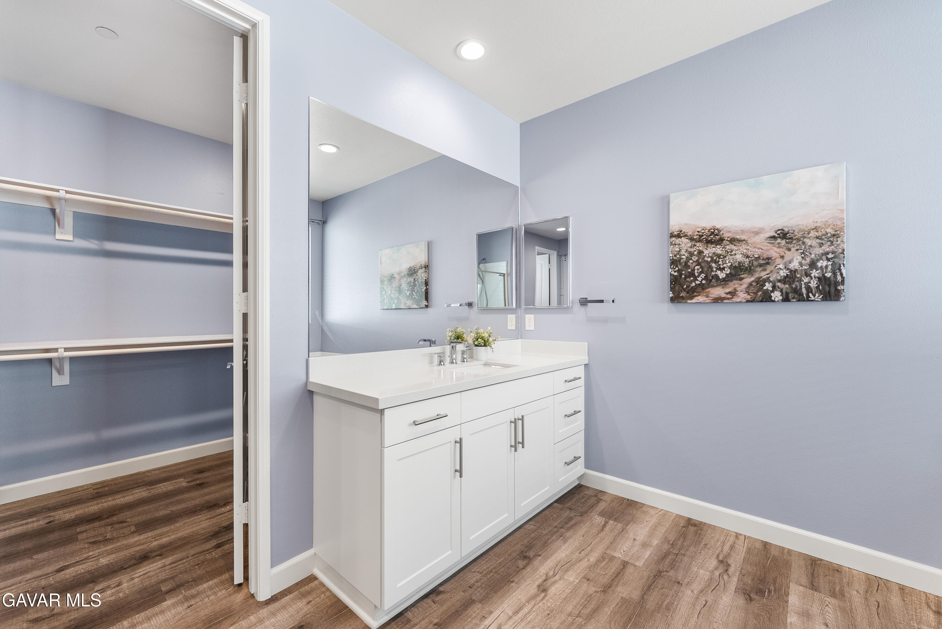 2108 Cork Oak Street Palmdale, CA 93551 - Photo 1 of 55 a spacious bathroom with a double vanity sink and a mirror