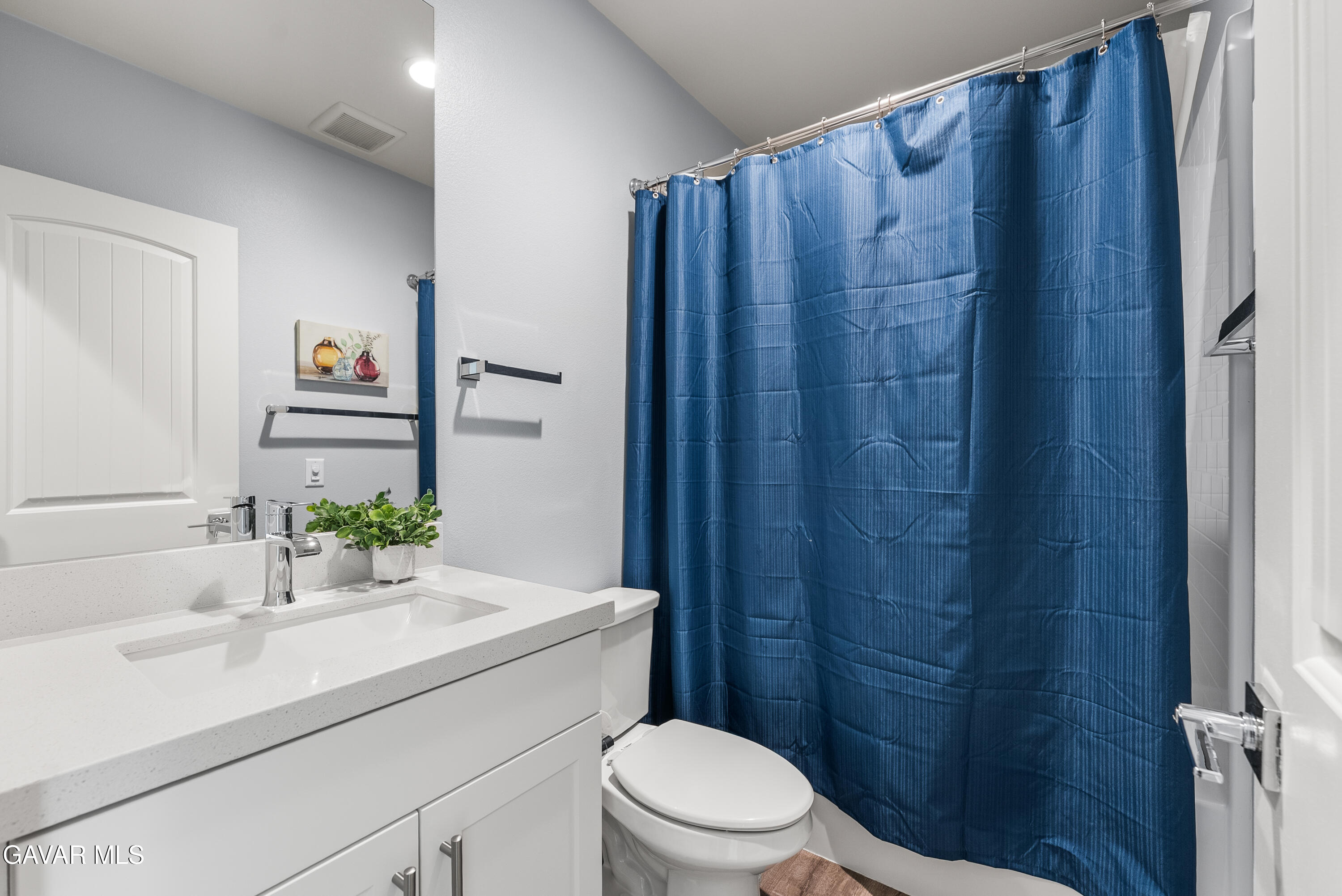 2108 Cork Oak Street Palmdale, CA 93551 - Photo 12 of 55 a bathroom with a sink a toilet and shower