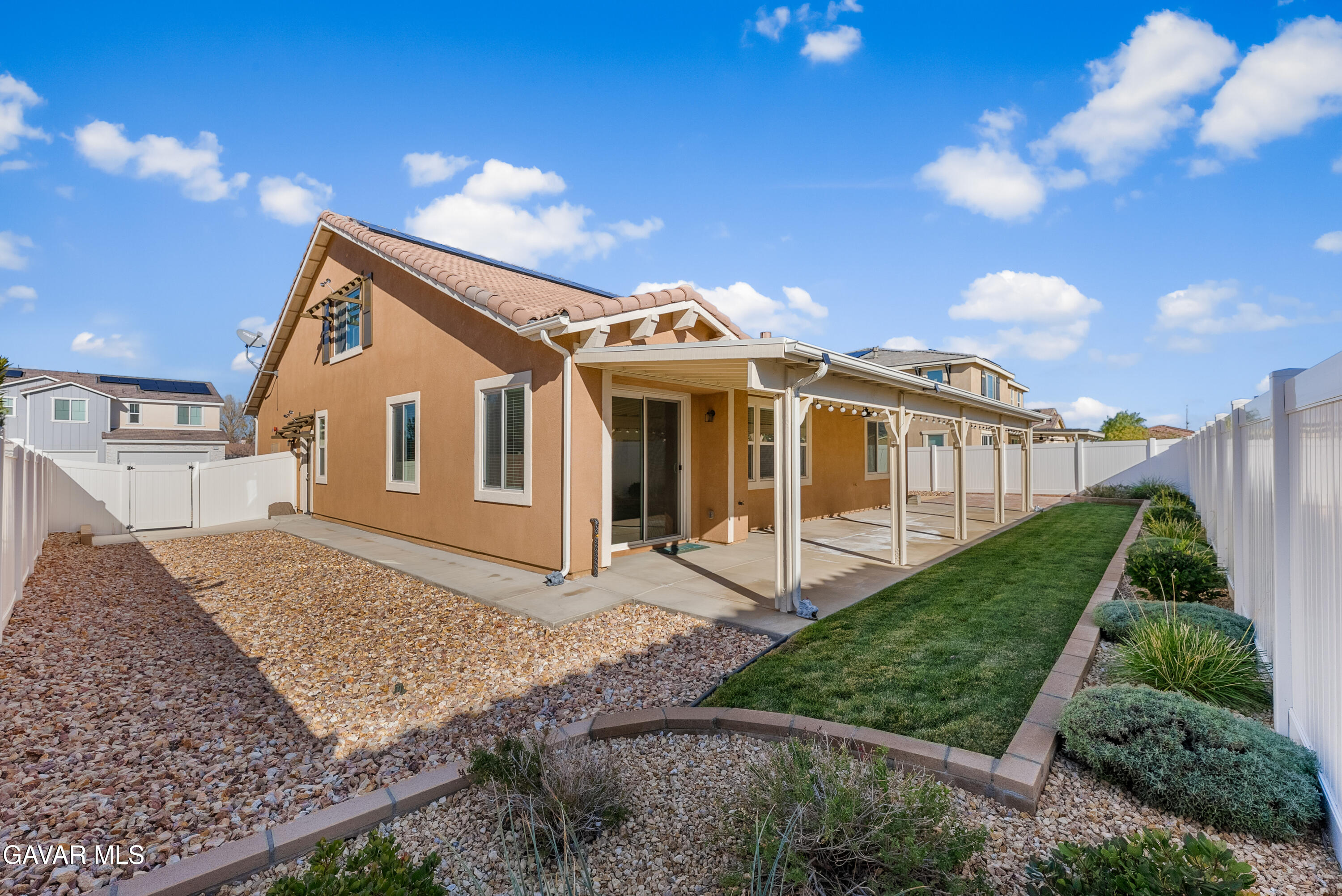 2108 Cork Oak Street Palmdale, CA 93551 - Photo 14 of 55 a front view of a house with yard