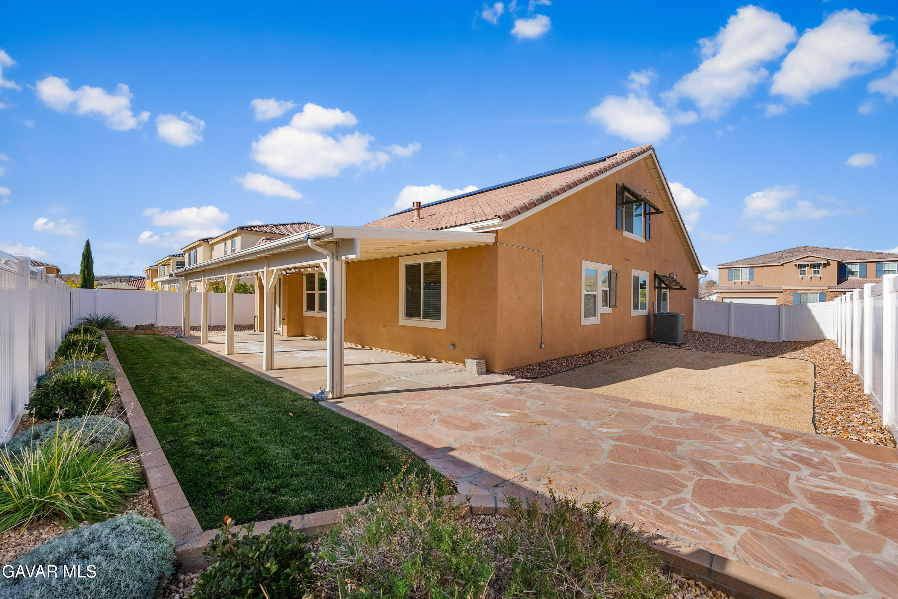 2108 Cork Oak Street Palmdale, CA 93551 - Photo 15 of 55 a front view of a house with a yard