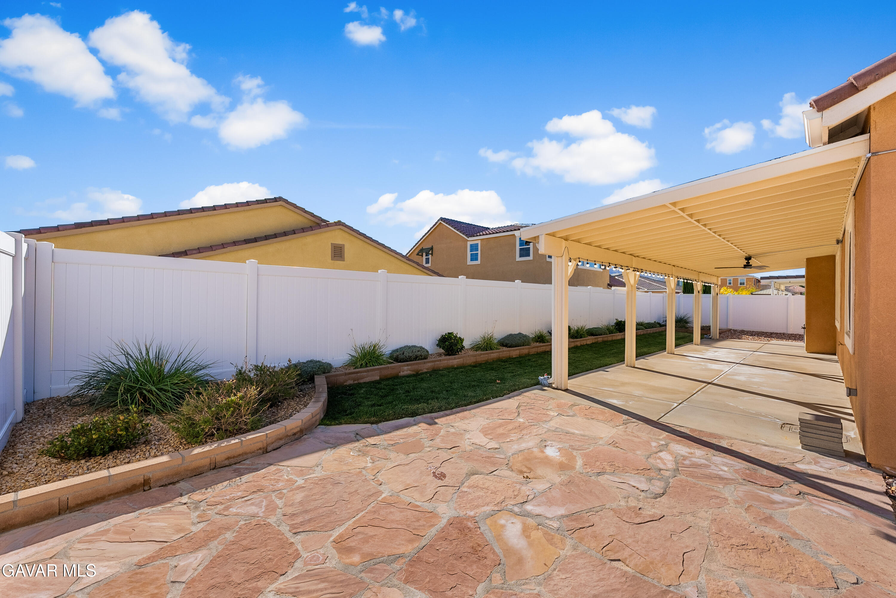 2108 Cork Oak Street Palmdale, CA 93551 - Photo 16 of 55 a view of a street with a house in the background