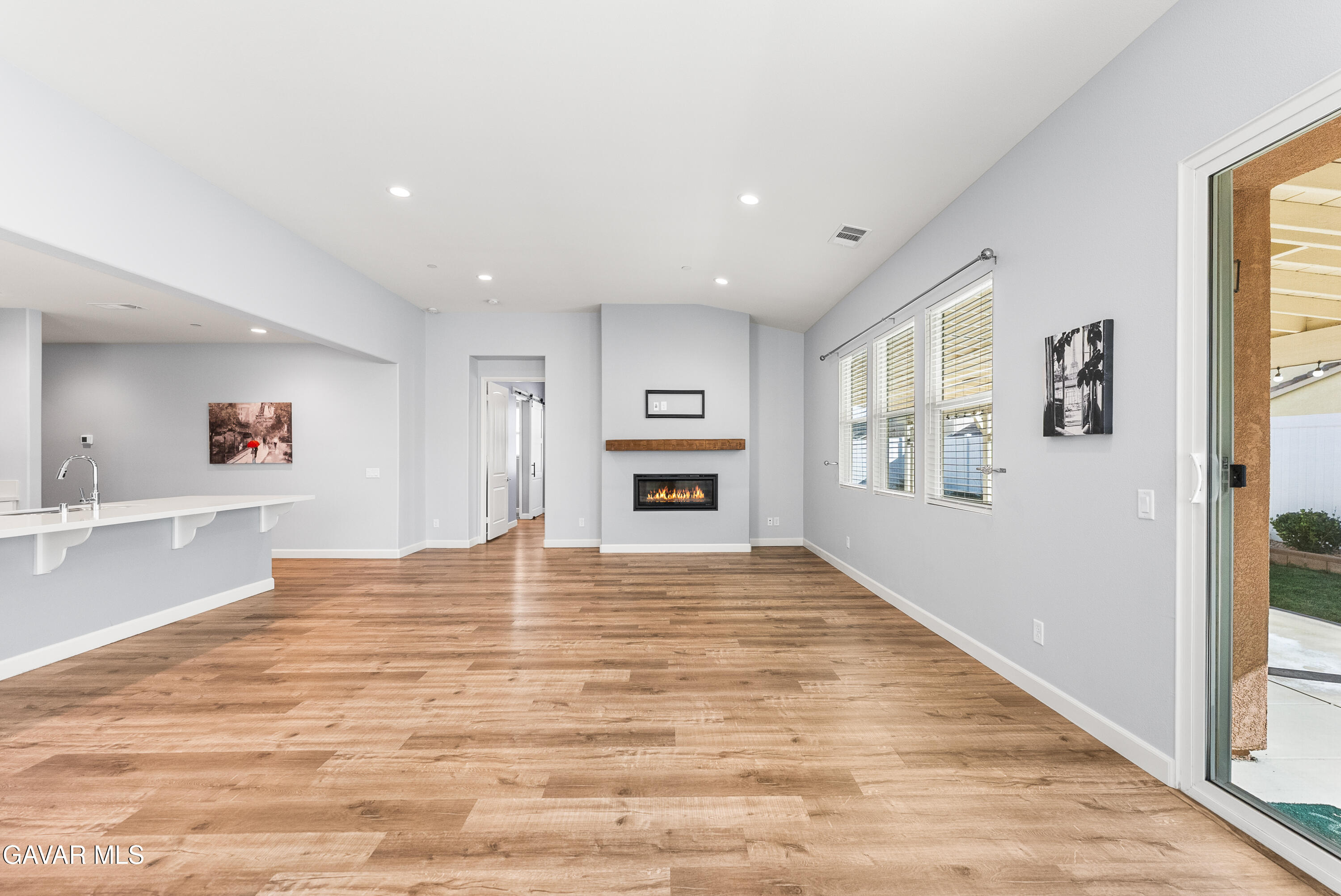 2108 Cork Oak Street Palmdale, CA 93551 - Photo 38 of 55 a view of empty room with wooden floor and windows