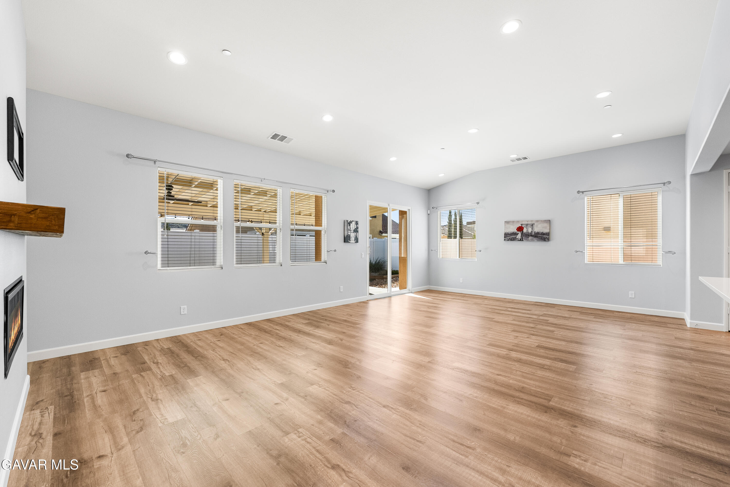 2108 Cork Oak Street Palmdale, CA 93551 - Photo 42 of 55 a view of empty room with wooden floor and fan
