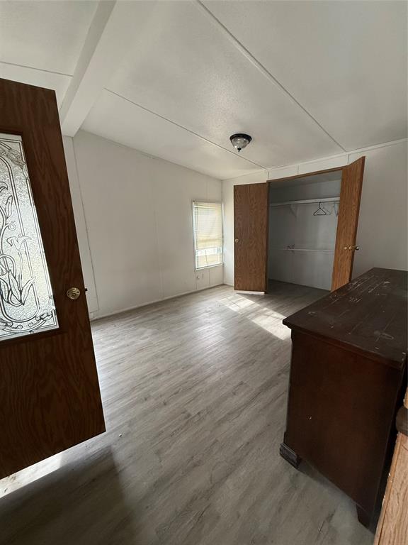118 Happy Trl Court Rhome, TX 76078 - Photo 5 of 9 a view of a livingroom with wooden floor