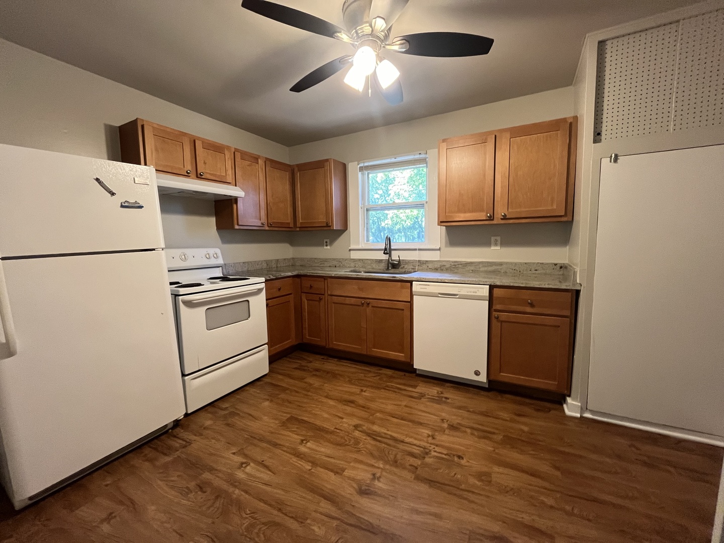 17206 South Lily Cache Road Plainfield, IL 60586 - Photo 3 of 7 a kitchen with stainless steel appliances granite countertop a stove a sink and a refrigerator