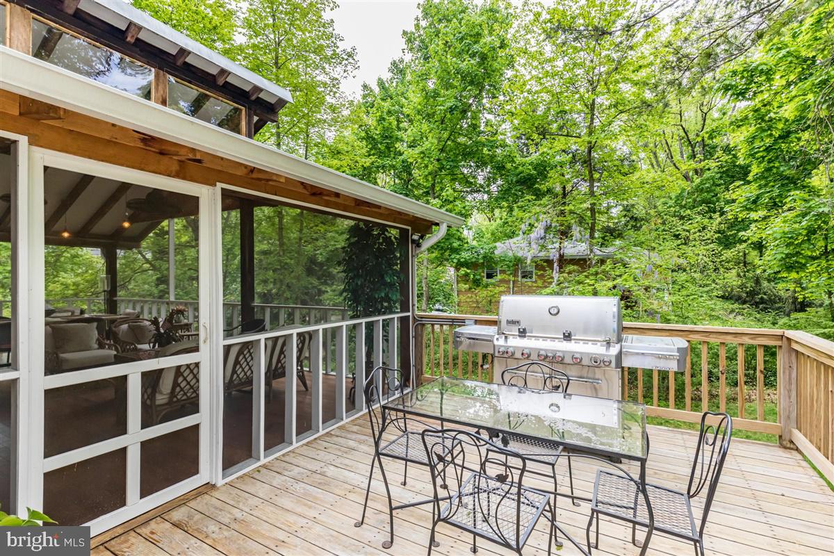 396 Riverside Drive Princeton, NJ 08540 - Photo 34 of 39 a view of a patio with a table and chairs