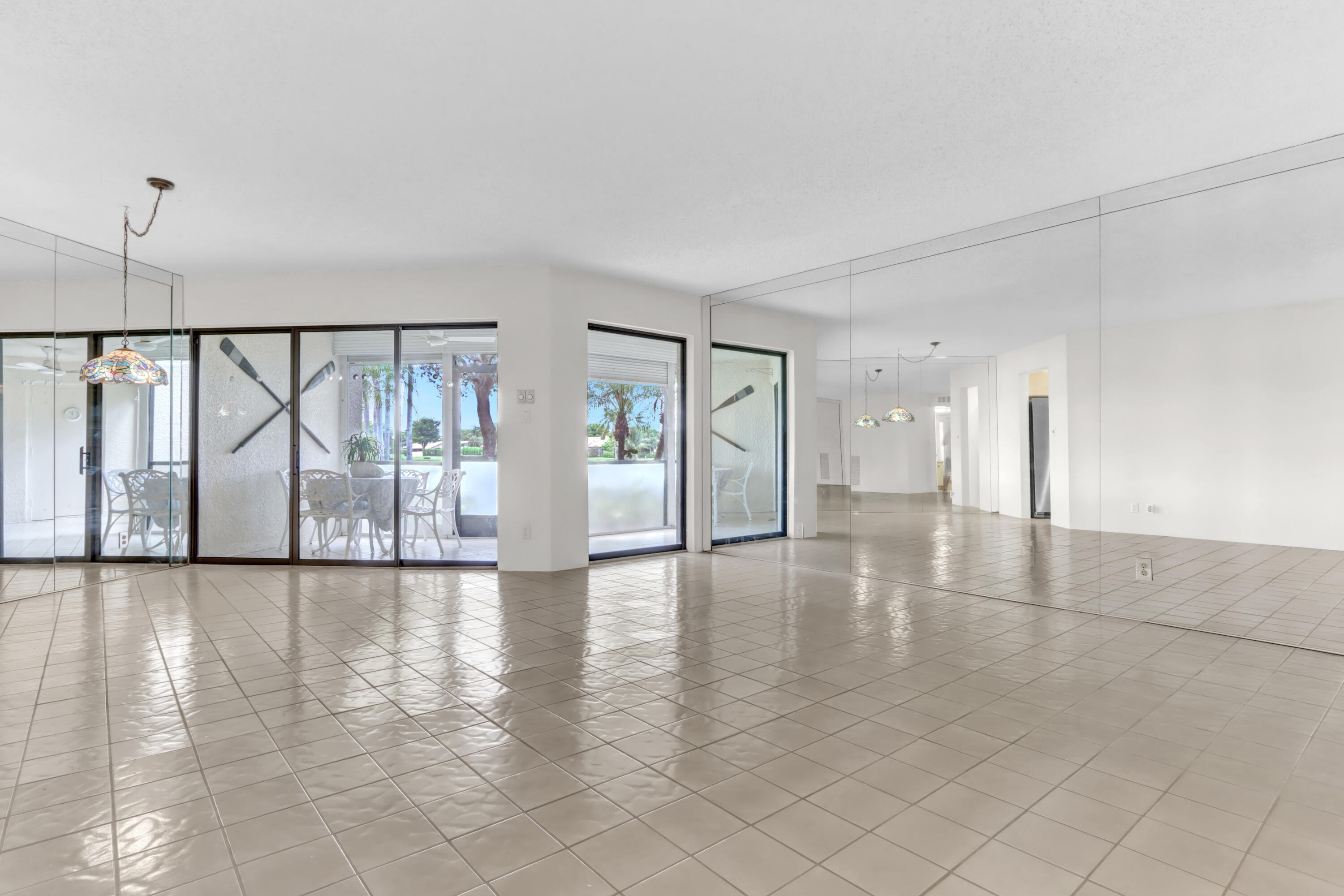 5800 Camino Del Sol, Unit 103 Boca Raton, FL 33433 - Photo 1 of 28 LIVING ROOM/DINING ROOM