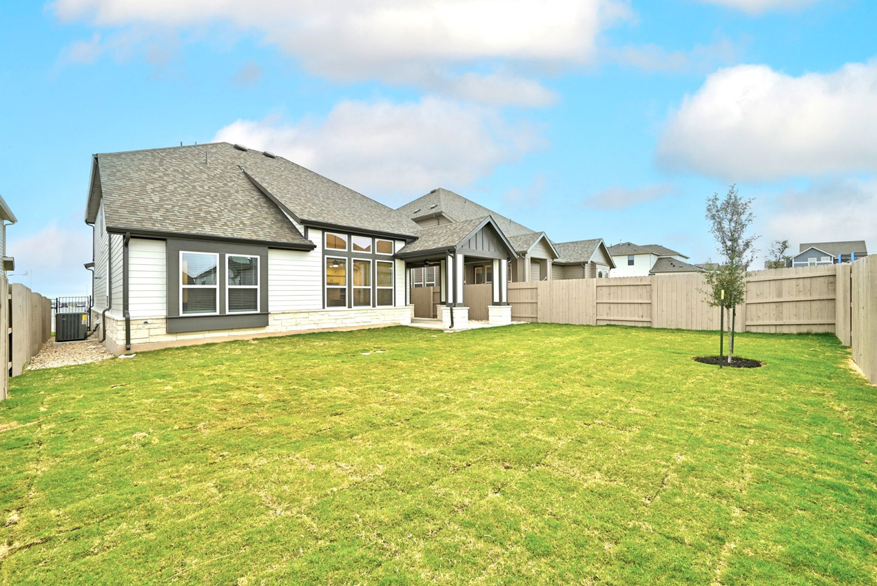 8700 Peristyle Drive Austin, TX 78744 - Photo 21 of 26 Backyard