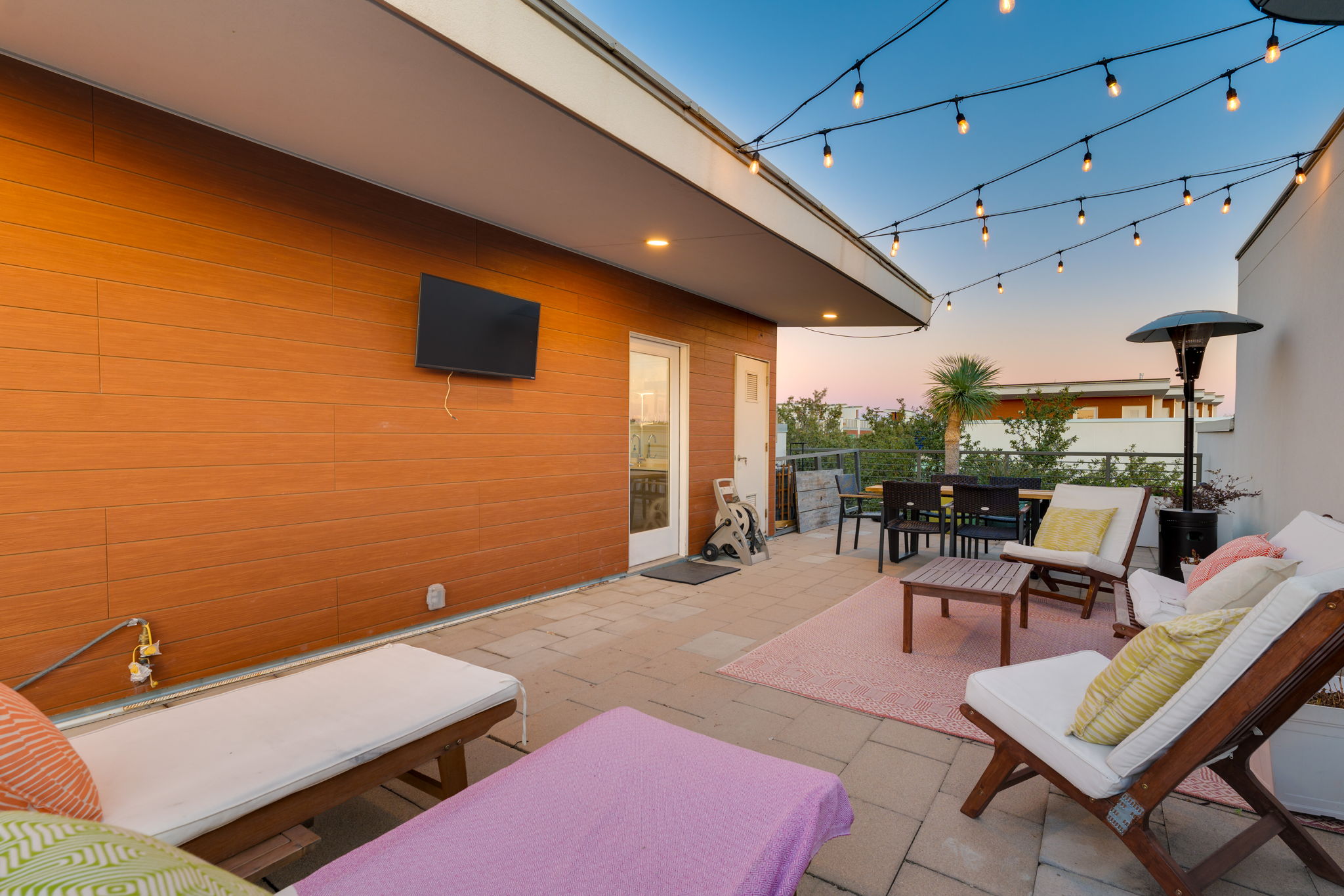 2301 South 5th Street, Unit 5 Austin, TX 78704 - Photo 33 of 39 Rooftop deck for entertaining featuring an outdoor living space
