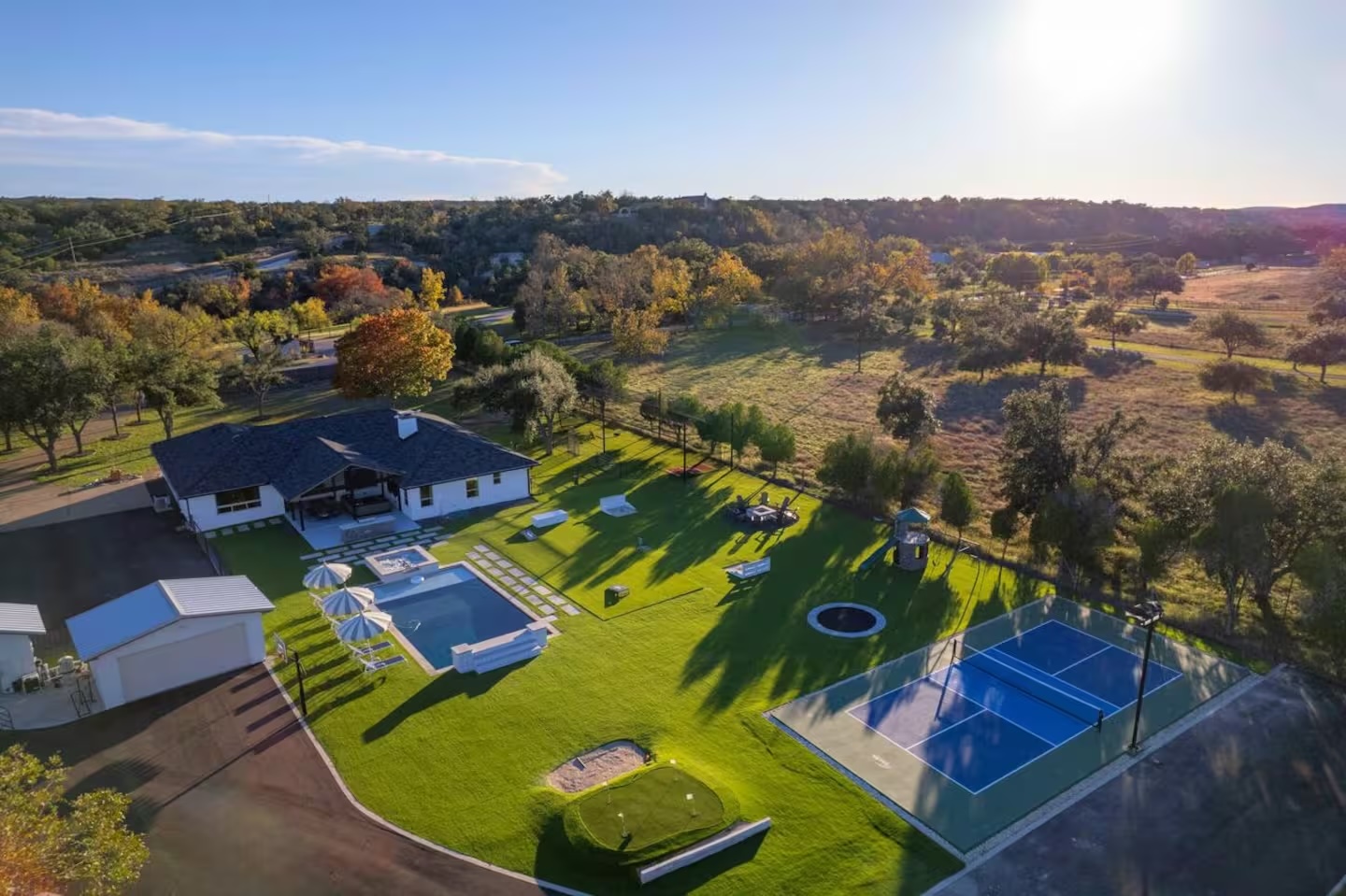 3500 Creek Road Dripping Springs, TX 78620 - Photo 2 of 21 View of subject property with a pool area