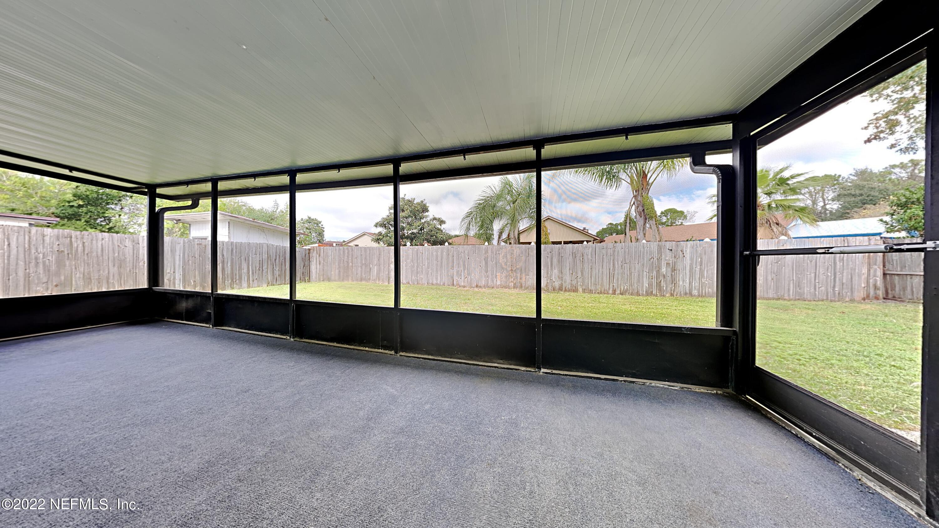 8451 Gemini Road Jacksonville, FL 32216 - Photo 9 of 11 Screened patio