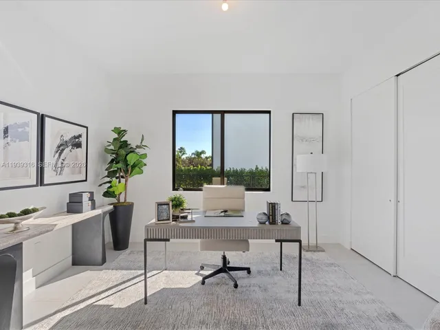 a kitchen with a sink a stove and a refrigerator