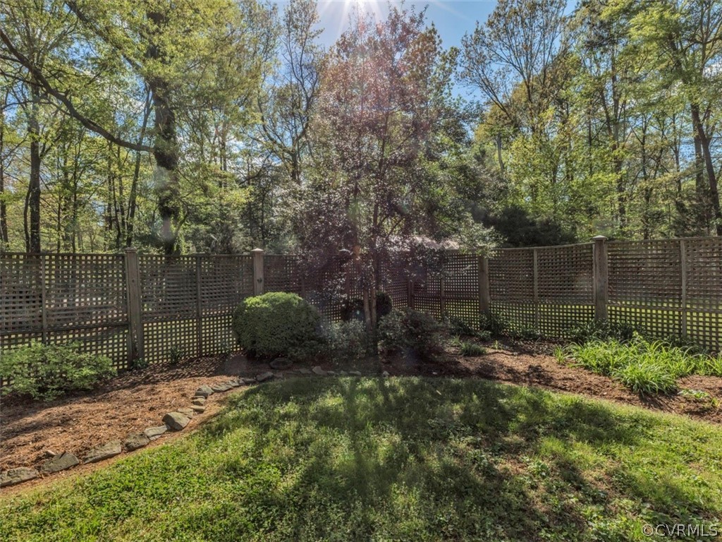 2720 Castle Hill Road Midlothian, VA 23113 - Photo 36 of 39 View of the fenced garden area! Flowers are begin