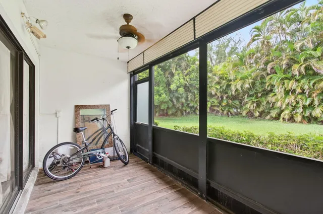 a view of an bike next to a window