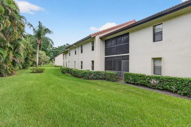 a house view with a garden space