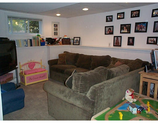 40 Davidson Road Framingham, MA 01701 - Photo 6 of 20 a living room with furniture and a couch