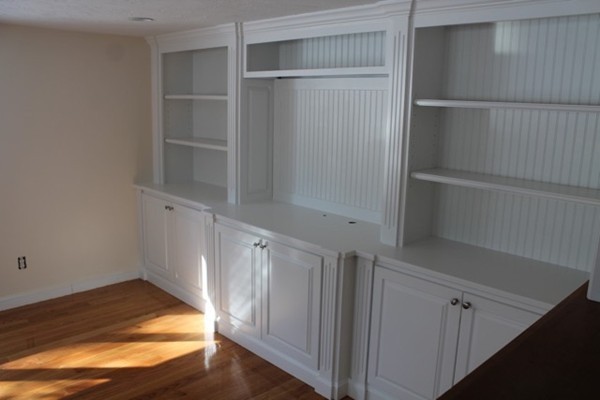 9 Birch Road Natick, MA 01760 - Photo 5 of 10 a view of walk in closet with empty racks