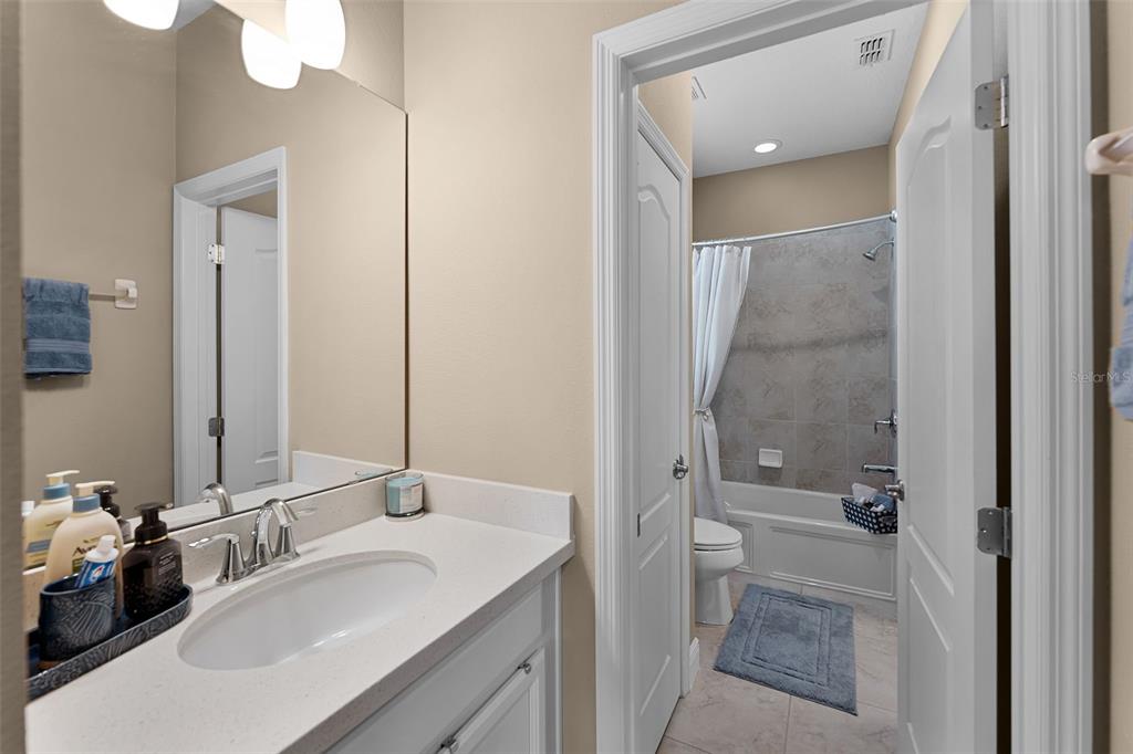 1208 Fieldstone Circle Oviedo, FL 32765 - Photo 18 of 43 a bathroom with a sink and a mirror