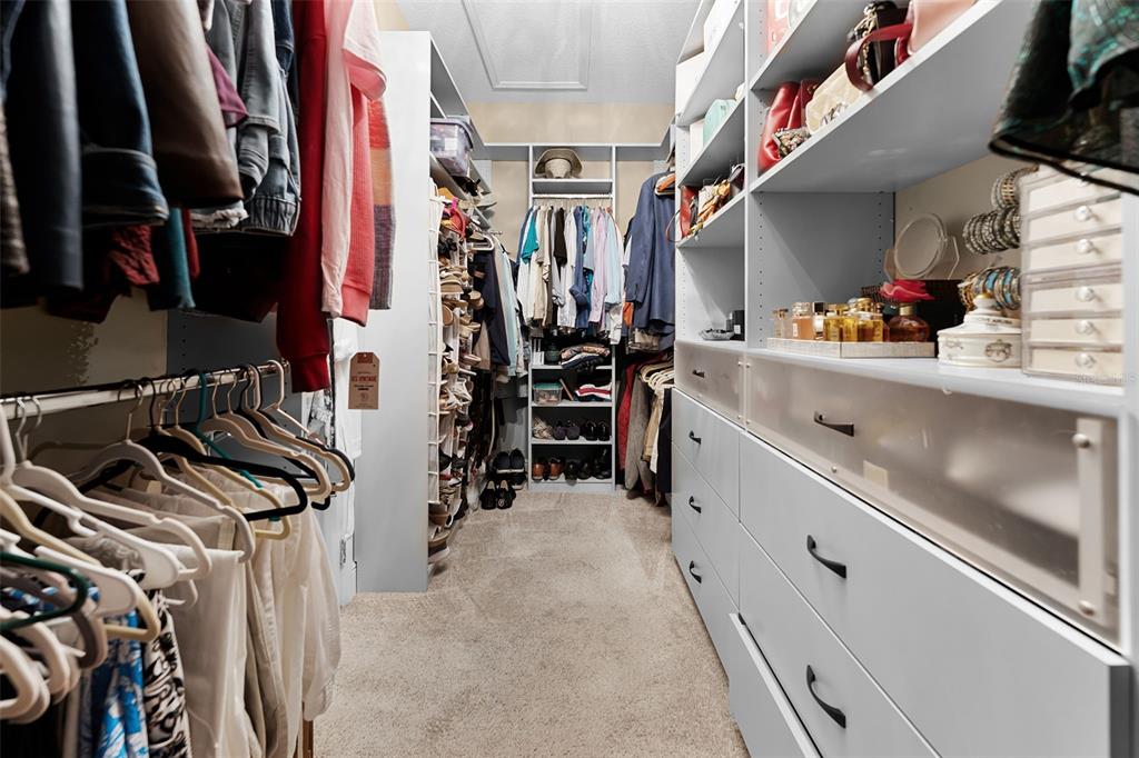 1208 Fieldstone Circle Oviedo, FL 32765 - Photo 28 of 43 a view of walk in closet with clothes and shoes