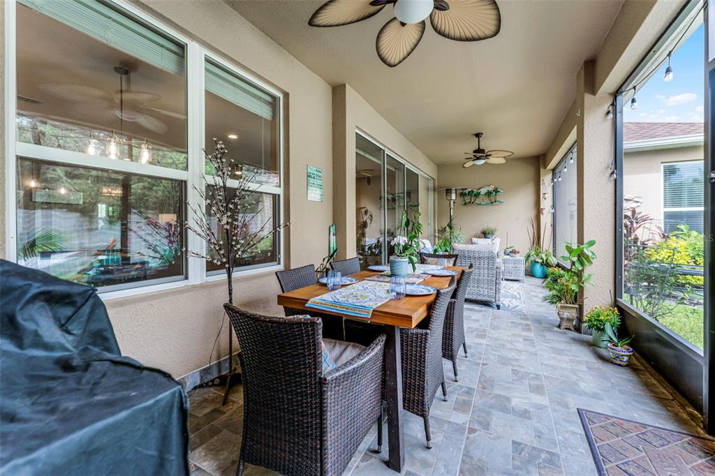 1208 Fieldstone Circle Oviedo, FL 32765 - Photo 32 of 43 a view of a dining room with furniture window and outside view