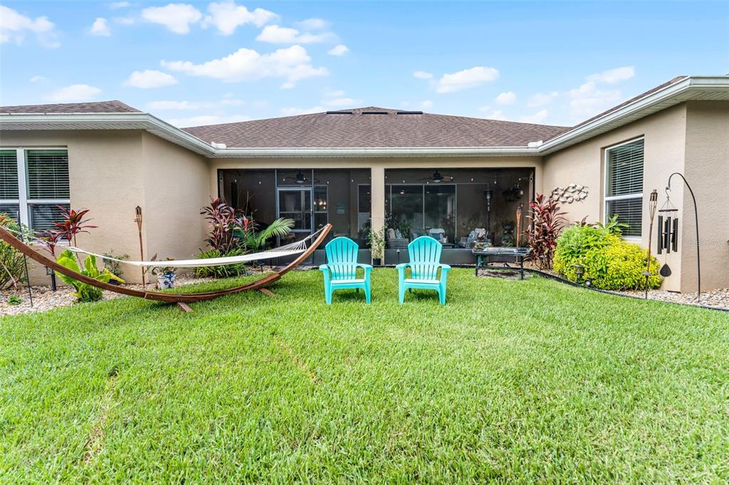 1208 Fieldstone Circle Oviedo, FL 32765 - Photo 33 of 43 a view of a house with backyard sitting area and garden