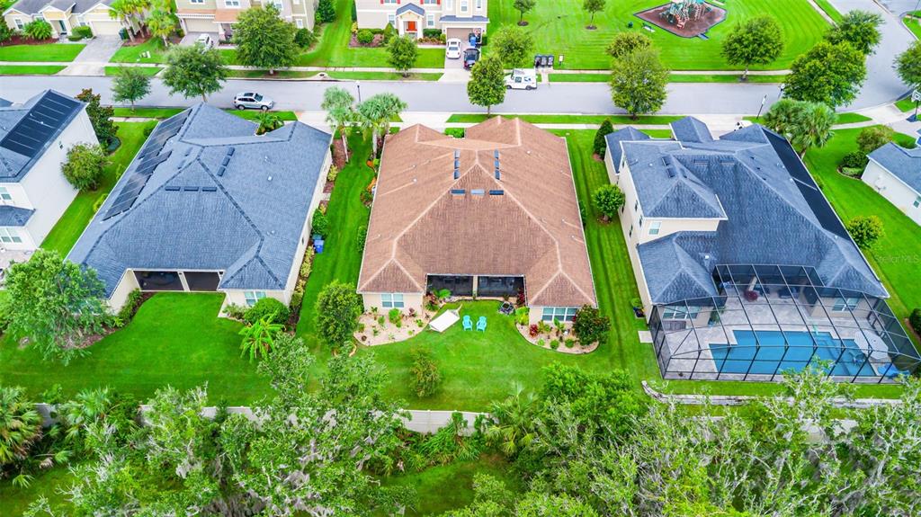 1208 Fieldstone Circle Oviedo, FL 32765 - Photo 37 of 43 an aerial view of multiple houses with yard