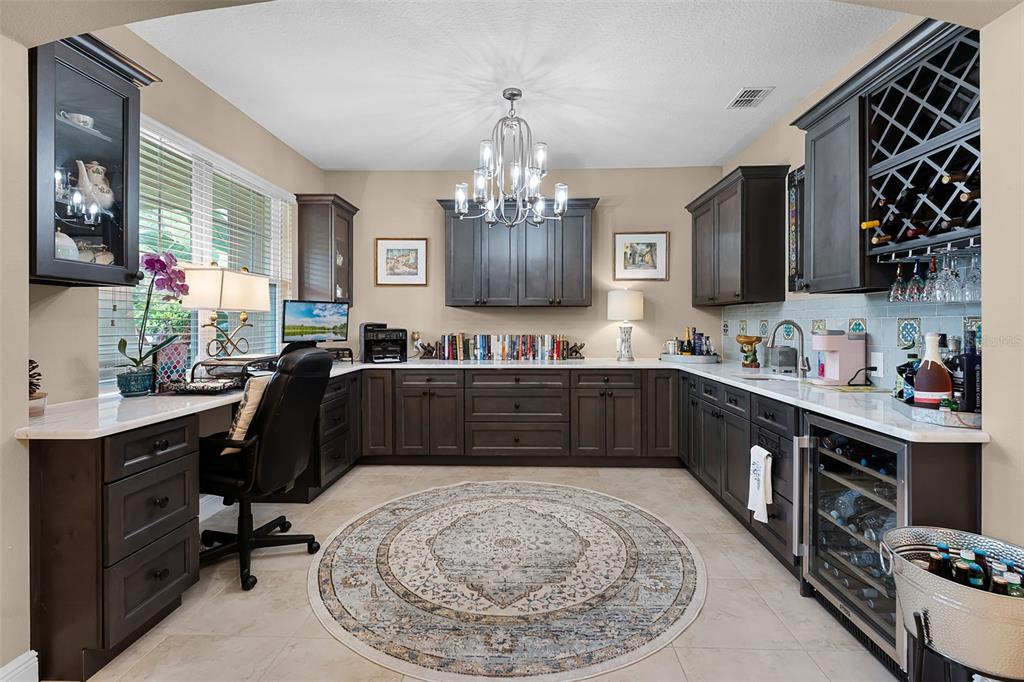 1208 Fieldstone Circle Oviedo, FL 32765 - Photo 8 of 43 a kitchen with a sink stove and microwave