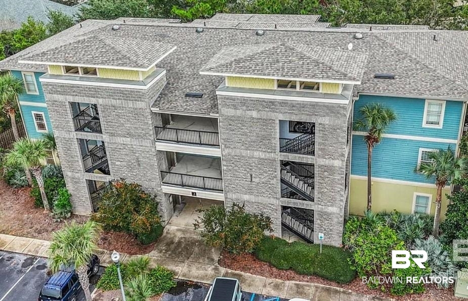 1430 Regency Road, Unit J102 Gulf Shores, AL 36542 - Photo 1 of 11 View of building exterior