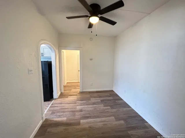 a view of an empty room and window