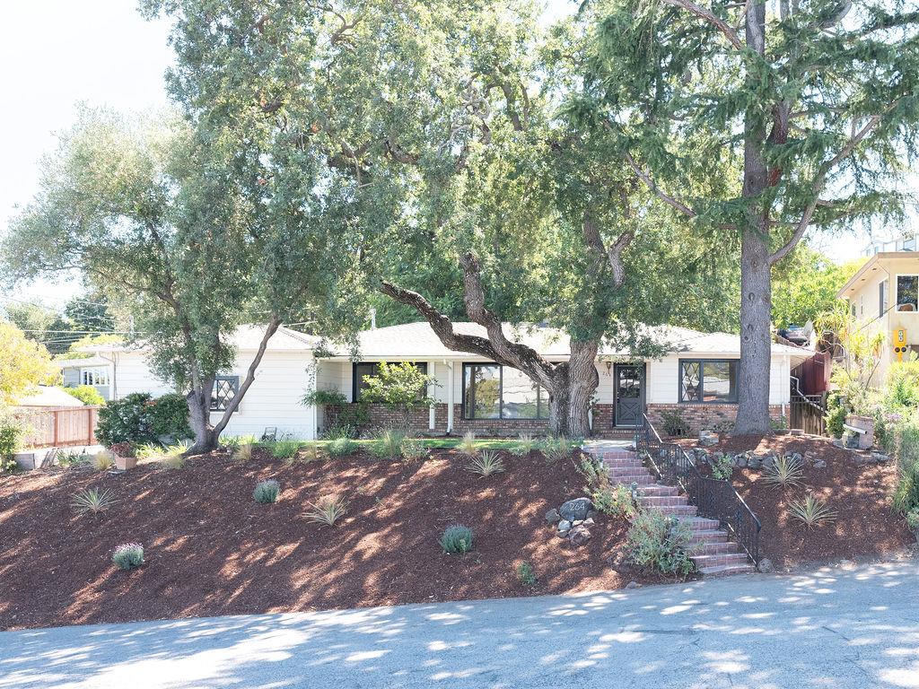 264 Upland Road Redwood City, CA 94062 - Photo 1 of 31 a view of a outdoor space with green space