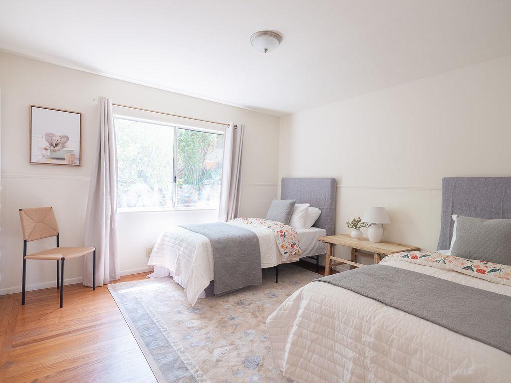 264 Upland Road Redwood City, CA 94062 - Photo 12 of 31 a bed room with two beds and a chair