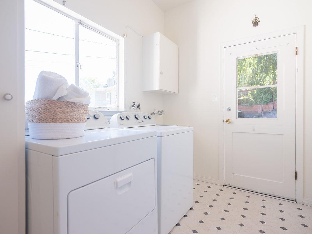 264 Upland Road Redwood City, CA 94062 - Photo 16 of 31 a utility room with closet a window and dryer