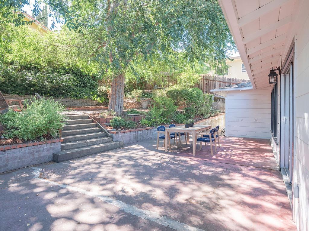 264 Upland Road Redwood City, CA 94062 - Photo 19 of 31 a view of a outdoor with a chairs and table in the patio