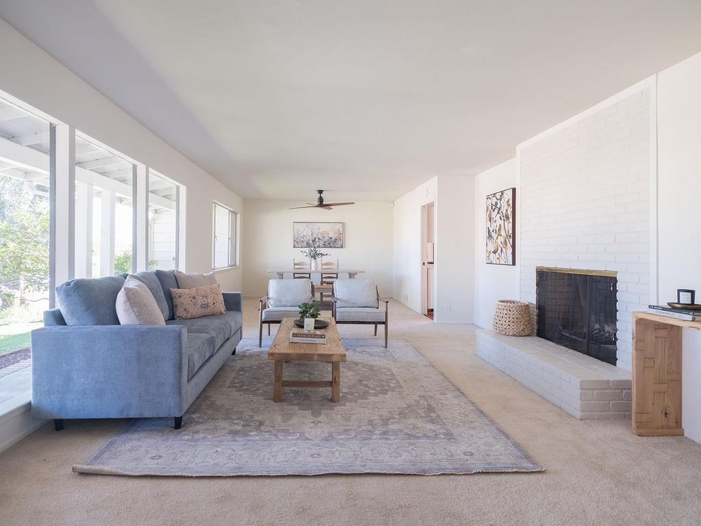 264 Upland Road Redwood City, CA 94062 - Photo 2 of 31 a living room with furniture and a rug