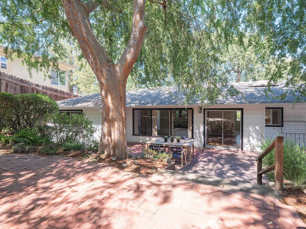 264 Upland Road Redwood City, CA 94062 - Photo 23 of 31 a backyard of a house with outdoor seating
