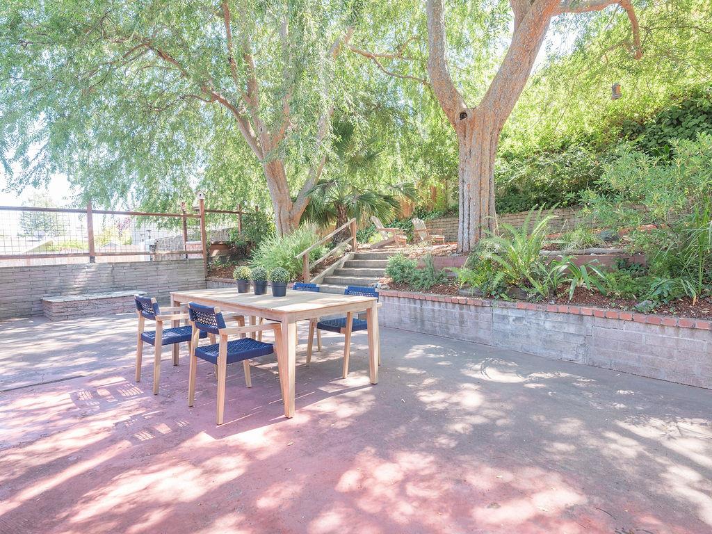 264 Upland Road Redwood City, CA 94062 - Photo 24 of 31 a view of a tables and chairs in a patio