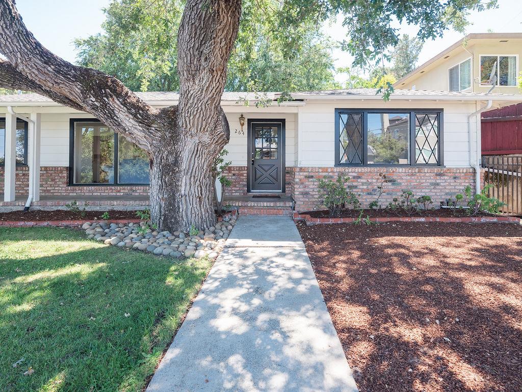 264 Upland Road Redwood City, CA 94062 - Photo 26 of 31 a front view of a house with garden