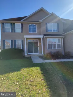 a view of a yard in front of a house