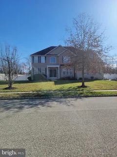 a view of a house with a big yard
