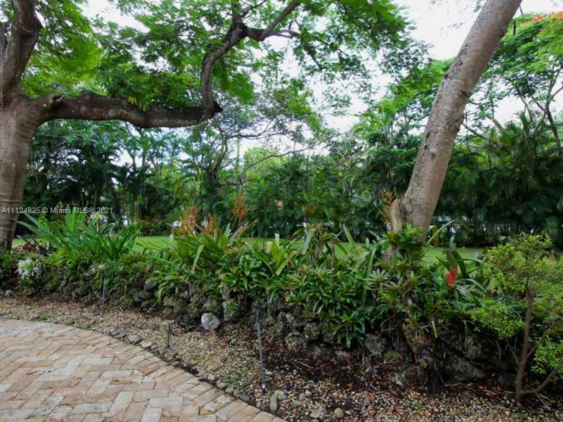 7975 Sunset Drive Miami, FL 33143 - Photo 2 of 21 a plant view in yard