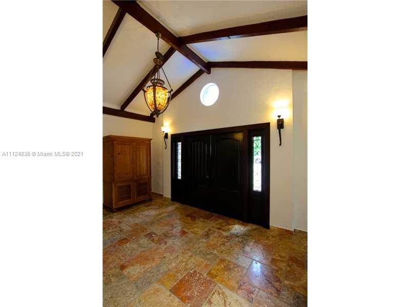 7975 Sunset Drive Miami, FL 33143 - Photo 3 of 21 a view of a livingroom with wooden floor