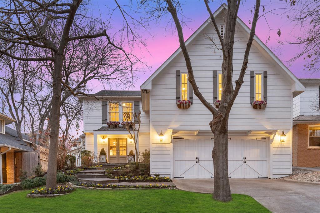 7915 Forest Trail Dallas, TX 75238 - Photo 1 of 1 a front view of a house with garden