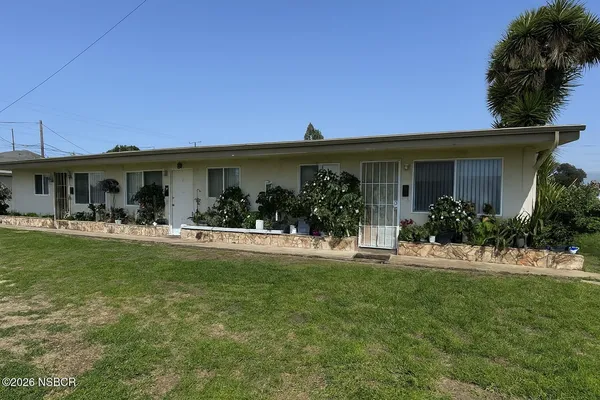 a view of a house with a patio