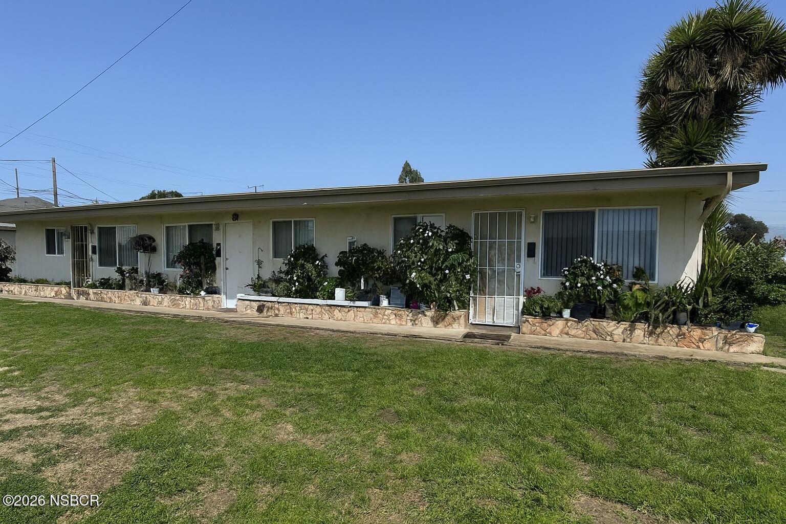 622 North B Street Lompoc, CA 93436 - Photo 1 of 7 a view of a house with a patio