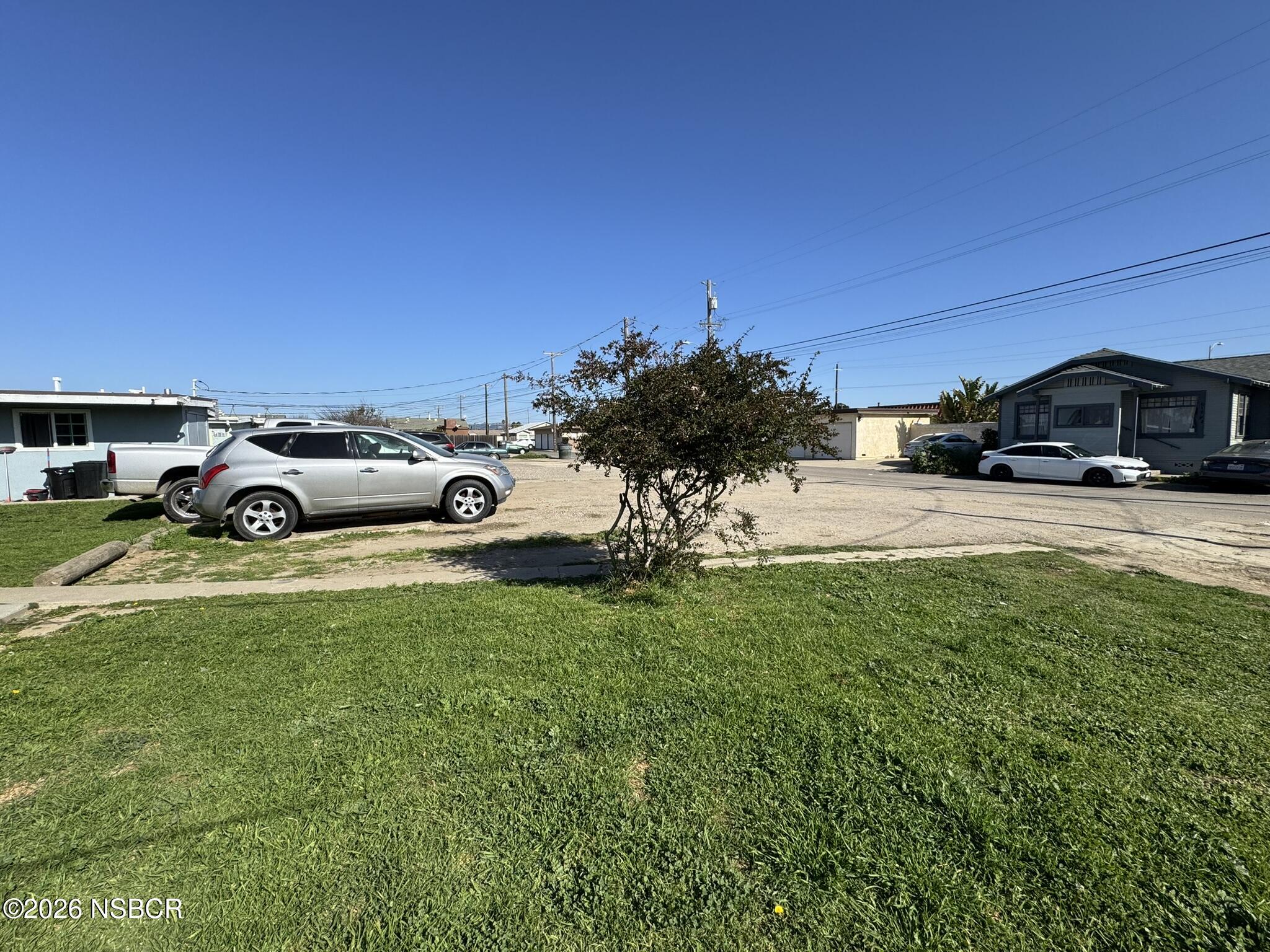 622 North B Street Lompoc, CA 93436 - Photo 6 of 7 a view of a car parked in front of a house