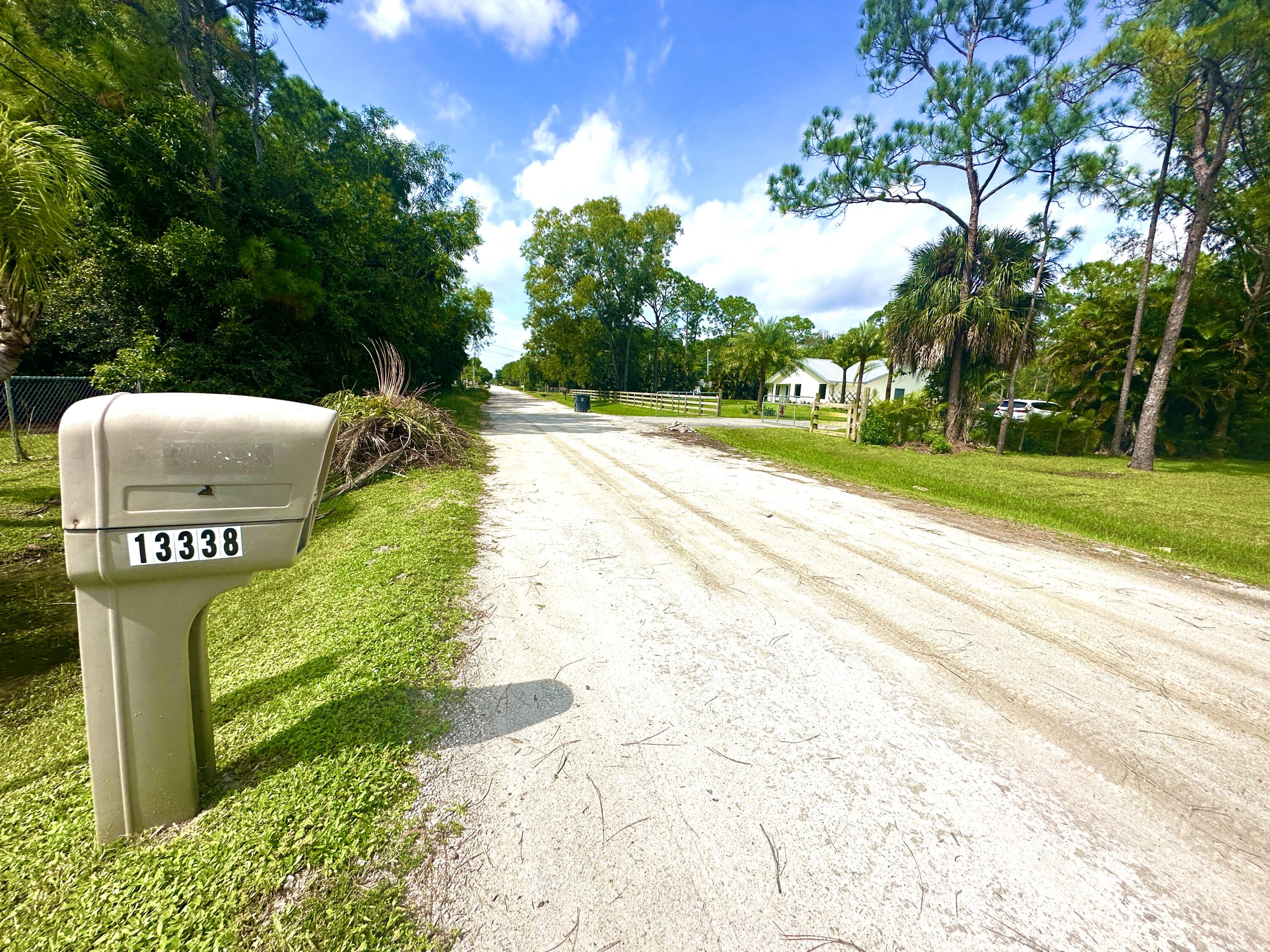 13338 76th Road North West Palm Beach, FL 33412 - Photo 32 of 138 a view of a park with large trees