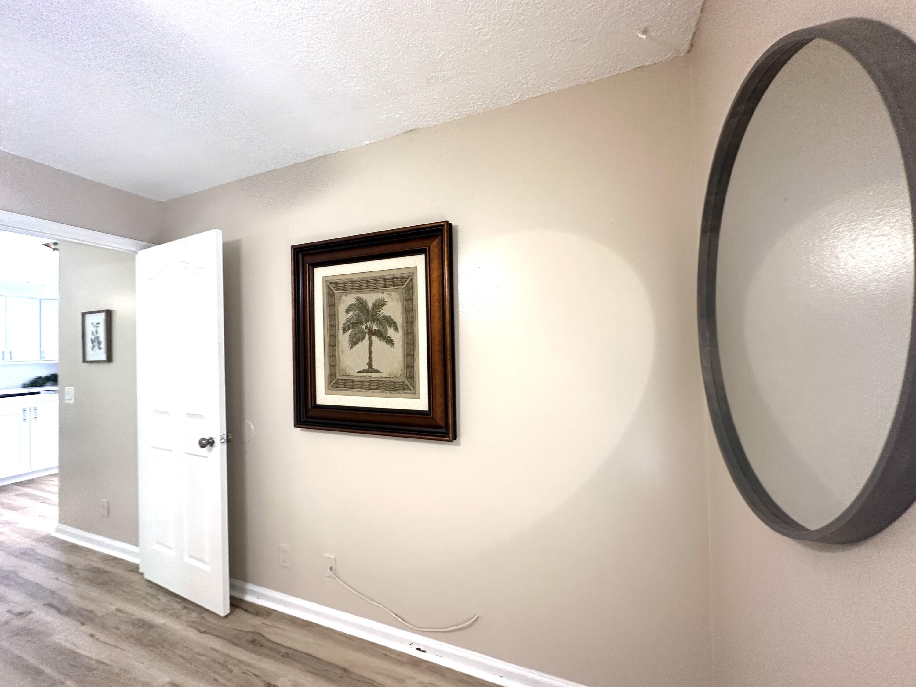 13338 76th Road North West Palm Beach, FL 33412 - Photo 55 of 138 a view of a hallway with entryway