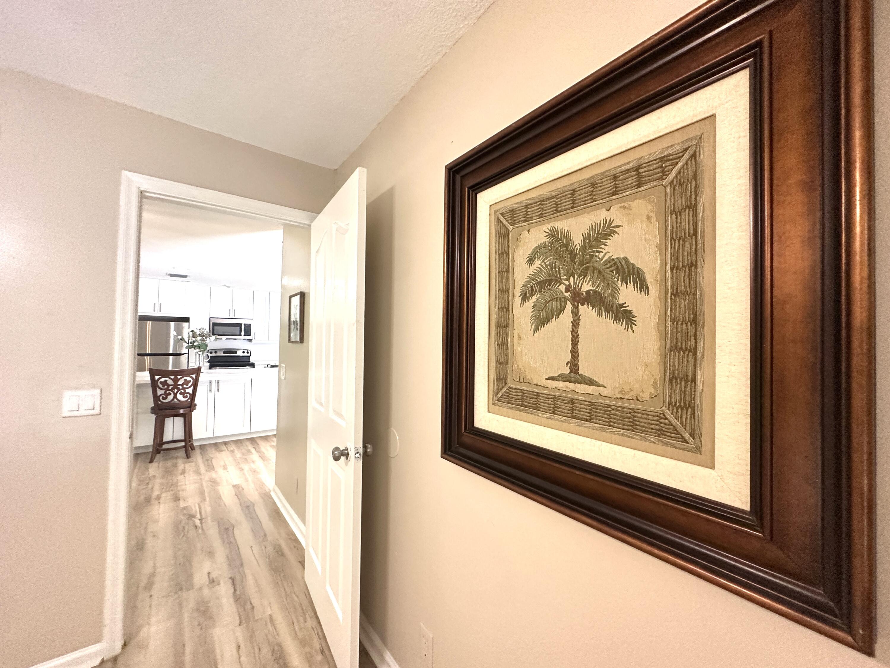 13338 76th Road North West Palm Beach, FL 33412 - Photo 56 of 138 a view of a living room with a large window with kitchen view