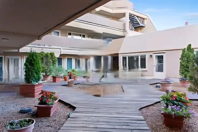a view of a house with sitting area
